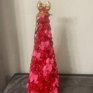 Cupcakes & Cashmere pink red bow tree TikTok viral